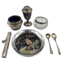 Early 20th century silver pin dish inset with an enamel panel of a bird on a branch D8.5cm, Victorian silver pepperette, silver salt, silver needle case and a glass salt with silver collar and two condiment spoons