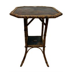 Victorian lacquered bamboo two-tier occasional table, decorated with floral motifs on black background