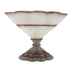 Rhodochrosite and quartz banded pedestal vase, the reeded fan shaped bowl supported by a carved sectional base on an oval shaped foot, H15cm x W20.5cm 