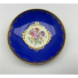 19th century Meissen cabinet cup and saucer, the cup painted in the manner of Wouwerman with a pastoral scene on blue ground, serpent moulded handle and paw feet, H9.5cm