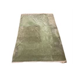 Chinese washed woollen green ground rug with floral and foliate design 310cm x 445cm
