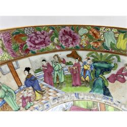 19th century Canton Famille Rose porcelain punch bowl, profusely decorated to the exterior with continuous scenes of officials and other figures, a similar scene to the interior, below a band of blossoming flowers and fruits, D34cm x H15cm