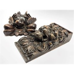 17th Century carved oak cherubs head with foliage 19cm x 18cm and a carved lion mask corbel 26cm x 13cm