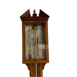 A 20th century mercury stick barometer in an earlier 18th century styled
Mahogany case with satinwood stringing to the edge, broken pediment, brass finial and round cistern cover, enclosed silvered register with Vernier recording barometric air pressure from 27 to 31 inches and weather predictions, Spirit thermometer indicating room temperature in degrees Fahrenheit, dial inscribed “Comitti Holborn” 




