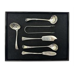 Late Victorian silver sifting spoon Birmingham 1899, early19th century silver sugar tongs Dutch silver sauce ladle and butter knife and two other items