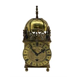 A contemporary 20th century brass cased replica Lantern clock with an English eight-day timepiece “Smiths” movement, lever platform escapement,  brass chapter ring with Roman numerals, steel hands and engraved dial centre. With Key.