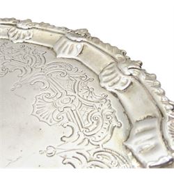 George III silver small salver with engraved decoration and shell moulded border on shaped supports D23cm London 1762 Maker Ebenezer Coker 13oz  Provenance:  3rd Earl of Feversham