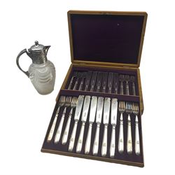 Victorian silver-plated and cut glass claret jug with hob nail and swag etched body, H26cm canteen of silver plated fish knives and forks with lion family crest, twelve settings 