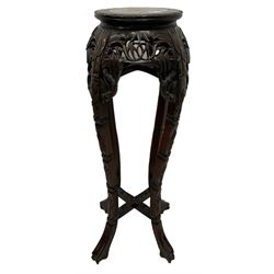 Chinese vase stand, the circular marble top over base with pierced floral carvings 