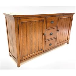 Late 20th century cherry sideboard, fitted with three drawers to centre, flanked by two panelled cupboards, each enclosing a shelf, raised on stile supports W158cm, H86cm, D45cm