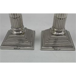 Pair of Edwardian silver Corinthian column candlesticks with stepped square bases H15cm Sheffield 1902 Maker Walker and Hall (2)
