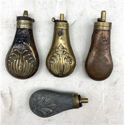 Four pistol powder flasks, two brass, one copper and another, three having embossed shell decoration, L12cm max (4)