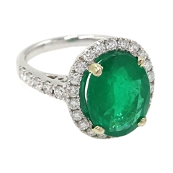  18ct white gold oval emerald and diamond ring, with diamond set shoulders, hallmarked, emerald approx 3.70 carat  