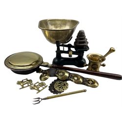  Vintage weighing scales with graduated weights and deep brass pan together with a 19th century brass pestle and mortar, telescopic toasting fork, horse brasses and warming pan