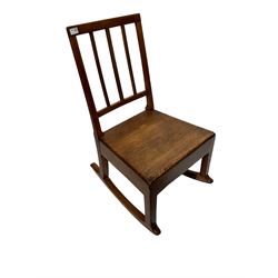 Late George III fruitwood rocking chair, with boarded seat