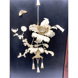 Pair of Japanese Meiji period framed black lacquer panels depicting similar hanging displays of carved bone ikebana with butterflies, 46cm x 70cm