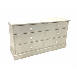 White painted chest fitted with six drawers on a skirted base W136cm, H73cm, D46cm