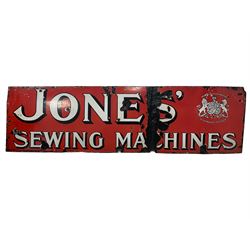 Victorian enamelled steel advertising sign 'Jones' Sewing Machines' by Royal Warrant to her Majesty the Queen,' the white lettering edged in black on a red ground