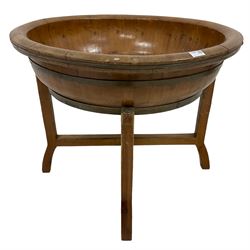 Mid-to late 20th century pine and brass coopered dough trough, circular trough on folding stand