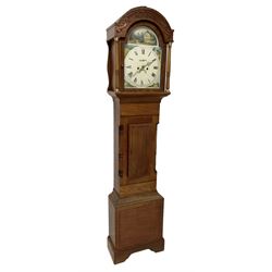 8-day - mid 19th century mahogany longcase, with a round top and carved frieze beneath, glazed break arch door flanked by two ring turned pilasters, trunk with recessed pilasters and a short flat topped door, on a rectangular plinth with a shaped skirting, painted dial with roman numerals, juxtaposed images of cottages to the spandrels and a depiction of a rural scene to the break arch, with a seconds dial, date aperture and stamped brass hands, with weights and pendulum.