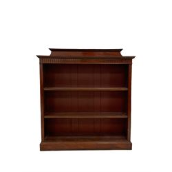 19th century mahogany open bookcase, the raised back over two fixed shelves, raised on a plinth base
