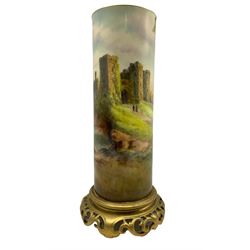 Royal Worcester vase decorated by Harry Ayrton, the cylindrical form body hand painted with a scene of Raglan Castle, signed H. Ayrton, upon a circular pierced base, with 'Raglan Castle' and printed marks beneath including shape number 161, H26cm