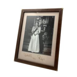 Royalty - Black and white photograph of Queen Elizabeth II and Prince Philip , signed and dated on the mount 1992 probably in auto pen, in easel frame 32cm x 25cm