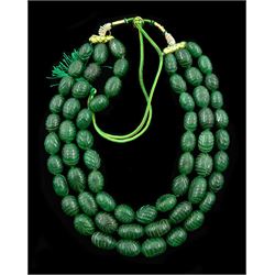 Large three strand earth mined carved oval emerald bead necklace, approx 2000 carat