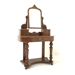 Victorian mahogany duchess dressing table, with angle poised arched mirror over four trinket drawers, bow front top with single frieze drawer, raised on turned front supports united by under tier, terminating in ceramic castors, W90cm, H150cm, D43cm