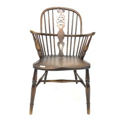Early 20th century Windsor chair, with hoop, spindle and splat back, saddle seat, raised on turned supports with stretcher W64cm