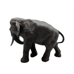 Japanese bronze of an elephant, Meiji period, standing with curled trunk, signature mark to foot, H36cm x L46cm