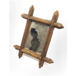 Small Tramp art wall mirror in geometrically carved stained pine frame, plate size 15cm x 10cm