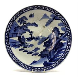 Late 19th Century Japanese charger decorated with a landscape in blue and white D49cm 