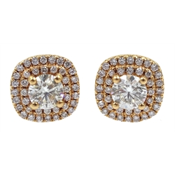 Pair of 18ct gold diamond cluster stud earrings, stamped 750, each central diamond approx 0.50 carat