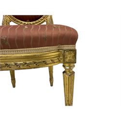 Late 19th century giltwood and gesso bedroom chair, the upholstered back with stepped arch cresting rail and ribbon twist moulding, upholstered seat, turned and fluted supports on castors