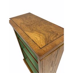 Pollard Oak Open Bookcase, the cross banded top with rosewood band, green painted interior with two adjustable shelves, raised on a skirted base W62cm, H97cm, D31cm