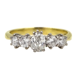 Gold five stone old cut diamond ring, stamped 18ct, the central pear shaped diamond approx 0.30 carat