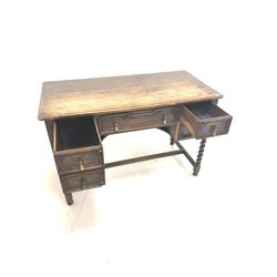 Early 20th Century oak kneehole desk fitted with five drawers on spiral turned supports, W114cm, D55cm, H76cm