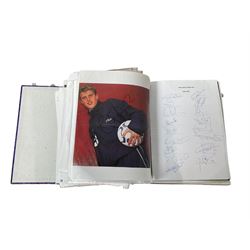 Mostly British footballing autographs and signatures including, Tim Sherwood, Sergei Rebrov, Darren Anderton, David Ginola, John Radford etc, in one folder