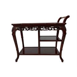 Chinese rosewood tea trolley, two long and one half tier with fruit and foliate decoration, raised on plastic castors