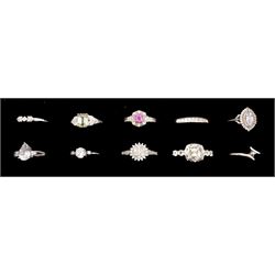 Ten silver stone set rings, including black diamond, white zircon, pink sapphire, all stamped or hallmarked