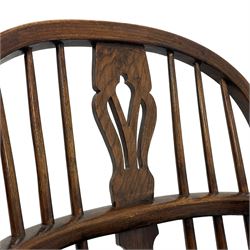 19th century elm and oak Windsor chair, low hoop stick back with pierced splat, dished seat raised on ring turned supports joined by crinoline stretcher