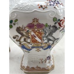19th Century Samson porcelain armorial casket, the hinged cover painted with a coat-of-arms and the motto 'Abstulit Qui Dedit', surrounded by floral sprays, with gilt brass mounts, W14cm x H11cm together with a similarly decorated porcelain jar of square section baluster form (2)