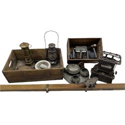 Wright & Butler cast iron stove, various cast iron flat irons, Homeland hammered pewter four-piece tea set, brass miners lamp, pestle & mortar, boot jack in the form of a beetle and miscellanea 
