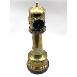 Late 19th/Early 20th century French automaton brass lighthouse clock, revolving top with clock, aneroid barometer and thermometer, on slate base, missing secondary thermometer H43cm