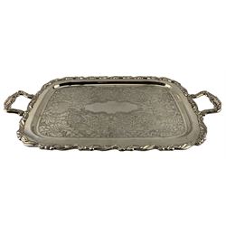 Oneida silver-plated twin handled tea tray with floral engraved decoration and scroll moulded border, L68cm