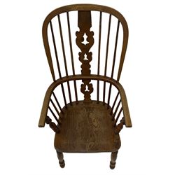 19th century ash and elm Windsor chair, the splat and spindle back over elm seat raised on turned supports 