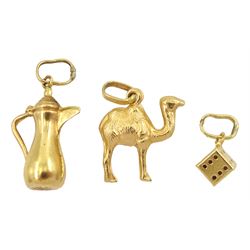 Three 18ct gold pendant/charms including jug camel and dice