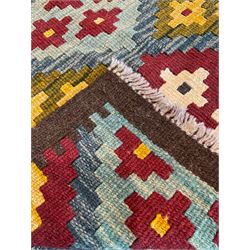 Maimana Kilim runner rug, the predominantly indigo field decorated with maroon and citrine lozenges with contrasting geometric ivory details