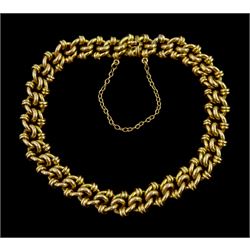 Early 20th century 15ct gold fancy knot link bracelet, stamped